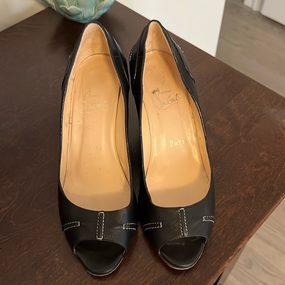 Christian Louboutin “Solana” black leather wedge heels